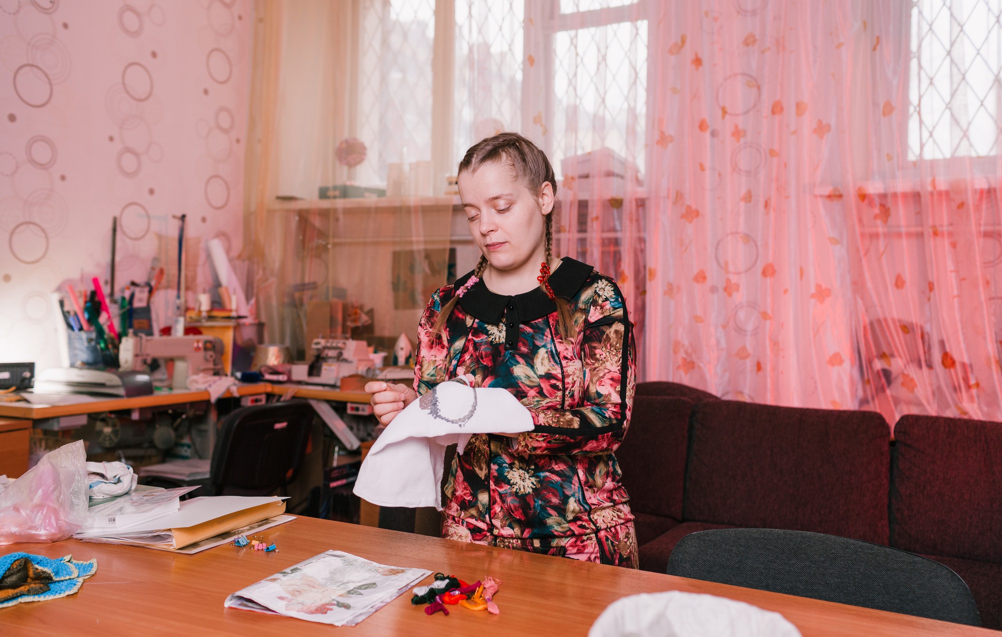 Invitation to workshop interior with embroidery samples